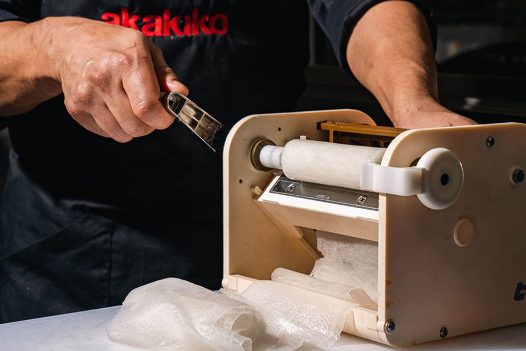 Chef preparing food at akakiko