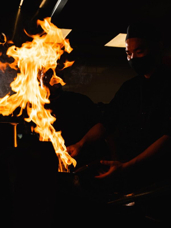 Chef preparing asian food