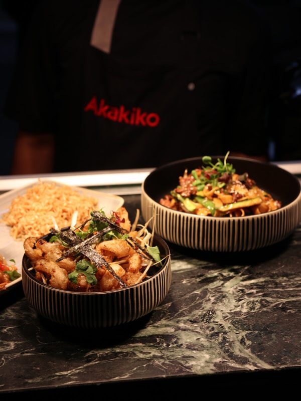 Asian inspired dishes on a marble table
